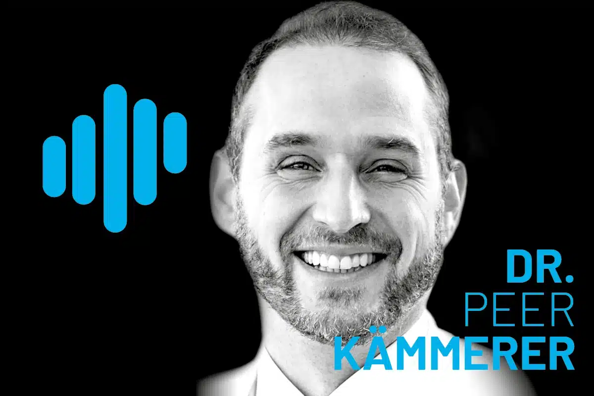 Dr. Peer Kämm erer smiling portrait with a blue logo on a black background, branding for dental biomaterials and professional care imagery.