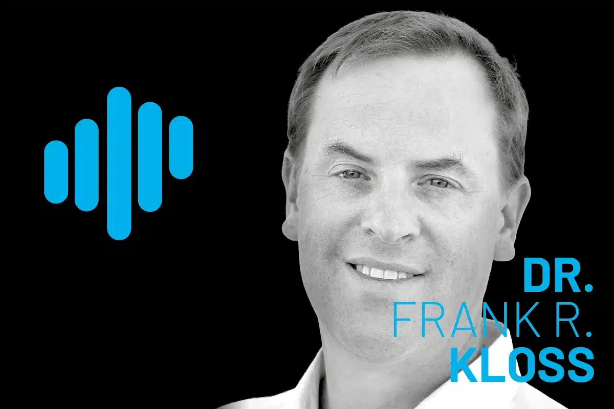 Dr. Frank R. Kloss in a grayscale portrait beside a bright blue waveform logo on a black background, with cyan typography reading FRANK R. KLOSS.