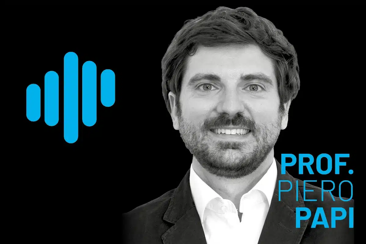 Portrait of Prof. Piero Papi in grayscale, beside a blue waveform logo on a solid black background, presenting a professional dental science visual.