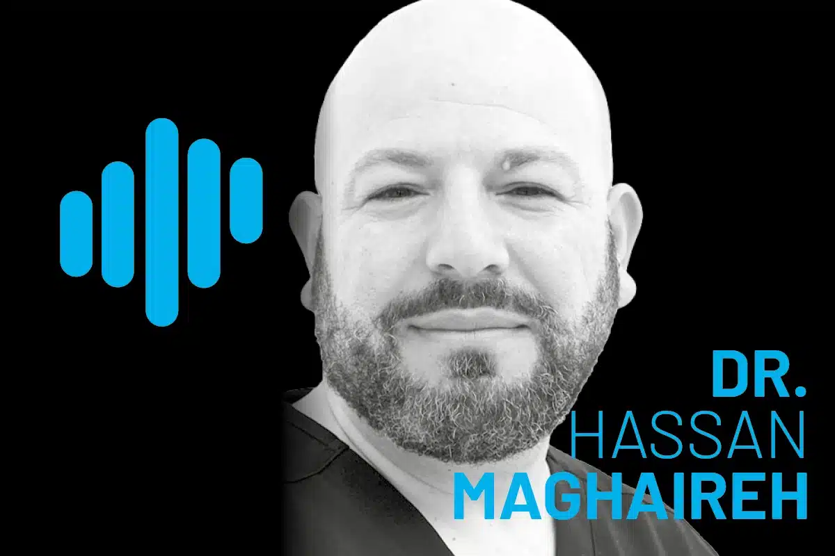 Dr. Hassan Maghaireh portrait against a black background with a blue waveform graphic, presenting a bold, professional dental expert for branding.