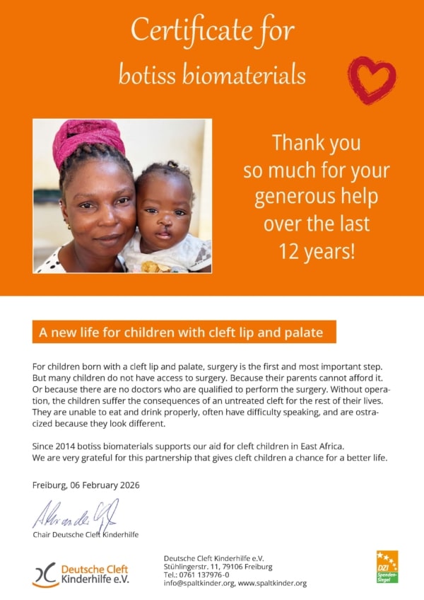 Certificate for botiss biomaterials on an orange background with a mother and child photo, plus supportive text and organizational logos
