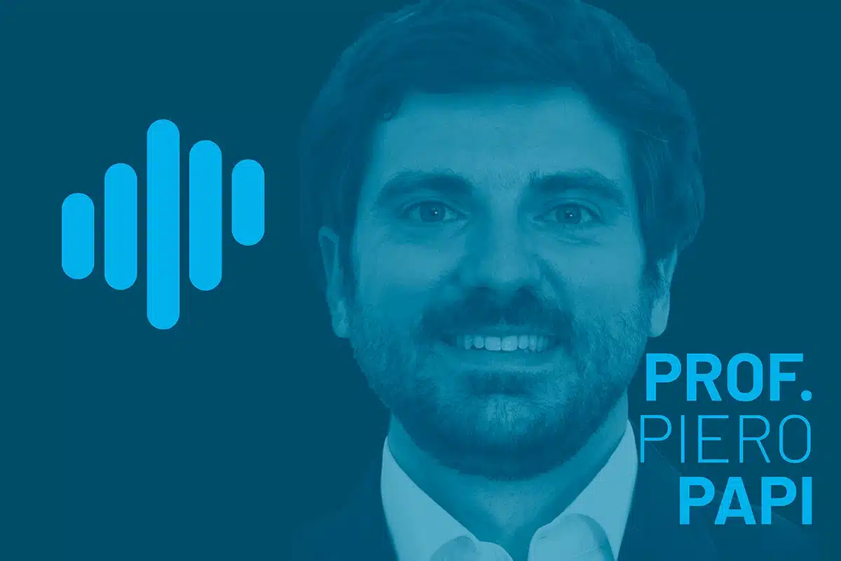 Portrait of Prof. Piero Papi in a blue-toned podcast visual with a left-side waveform logo, presenting a clean professional look with a subtle facial beard